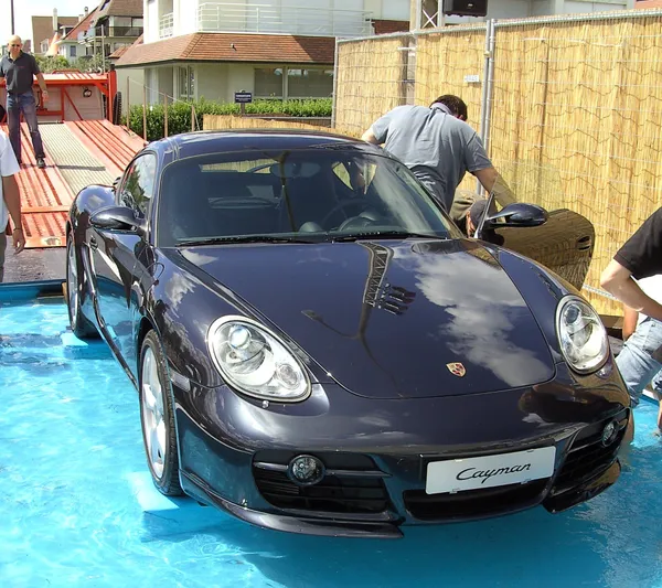 Porsche Cayman azul noche entregado por JDC-Trans